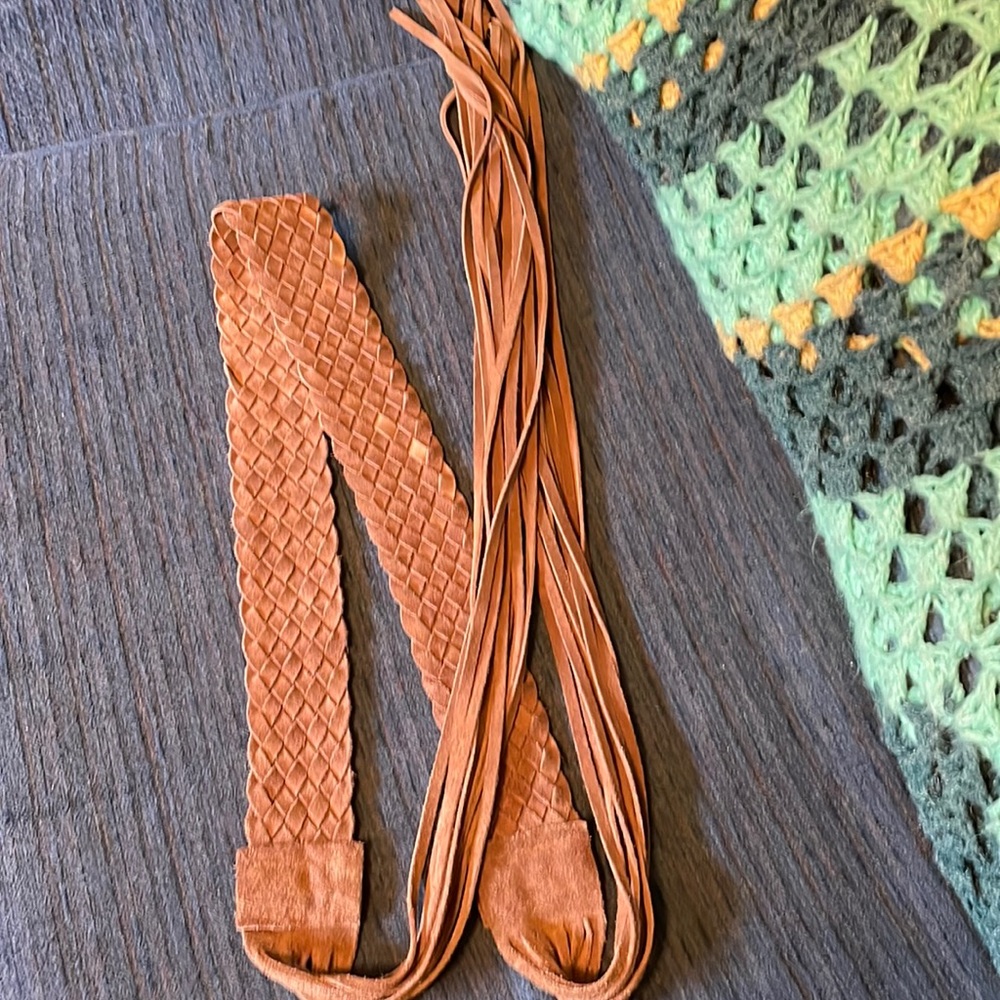 Very cool and awesome braided leather belt! Awesome fringes, genuine leather!